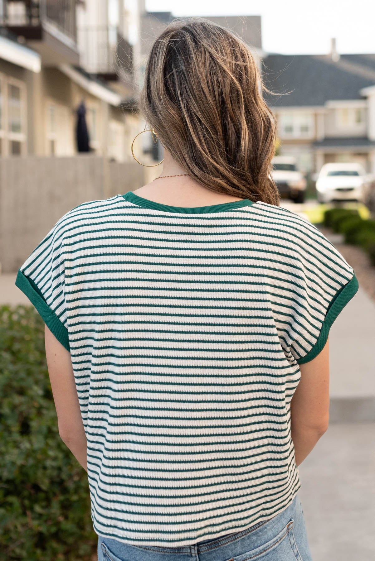 Back view of the green stirpe top