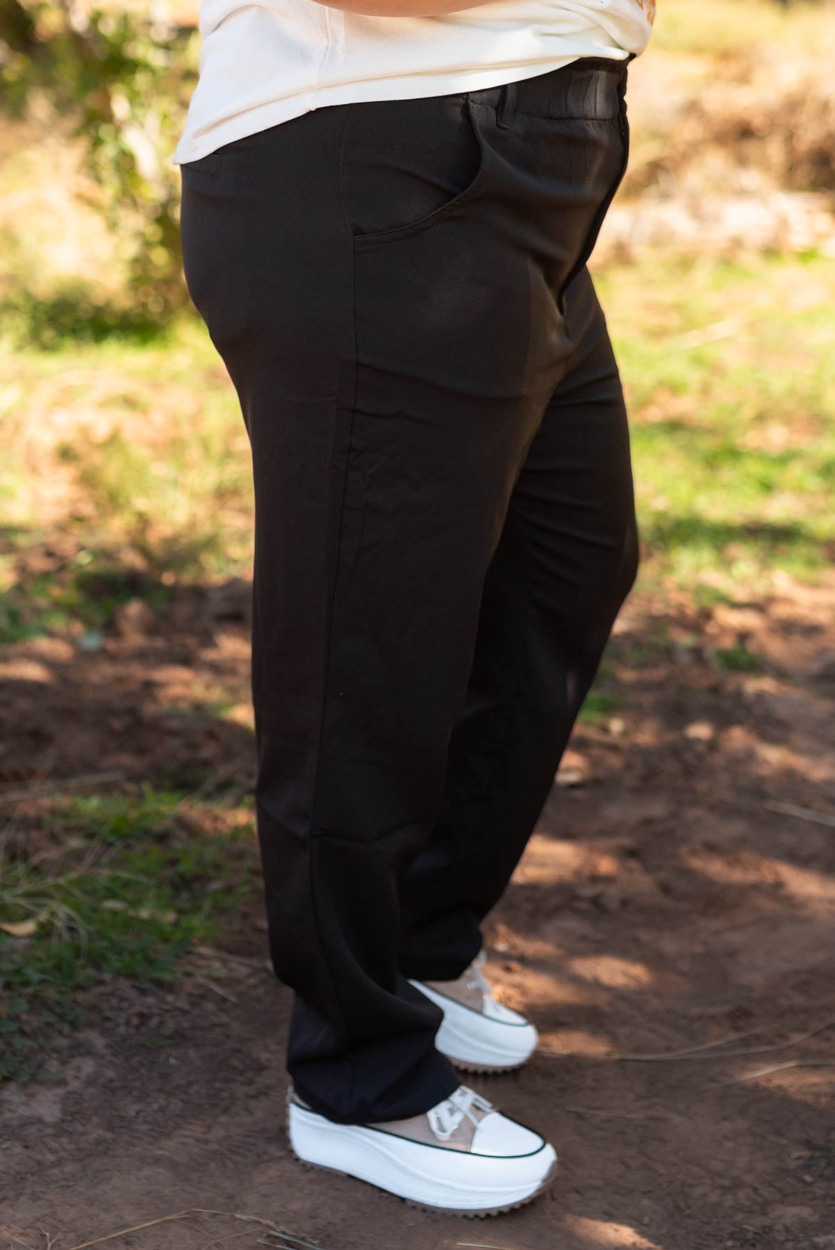 Side view of plus size black pants