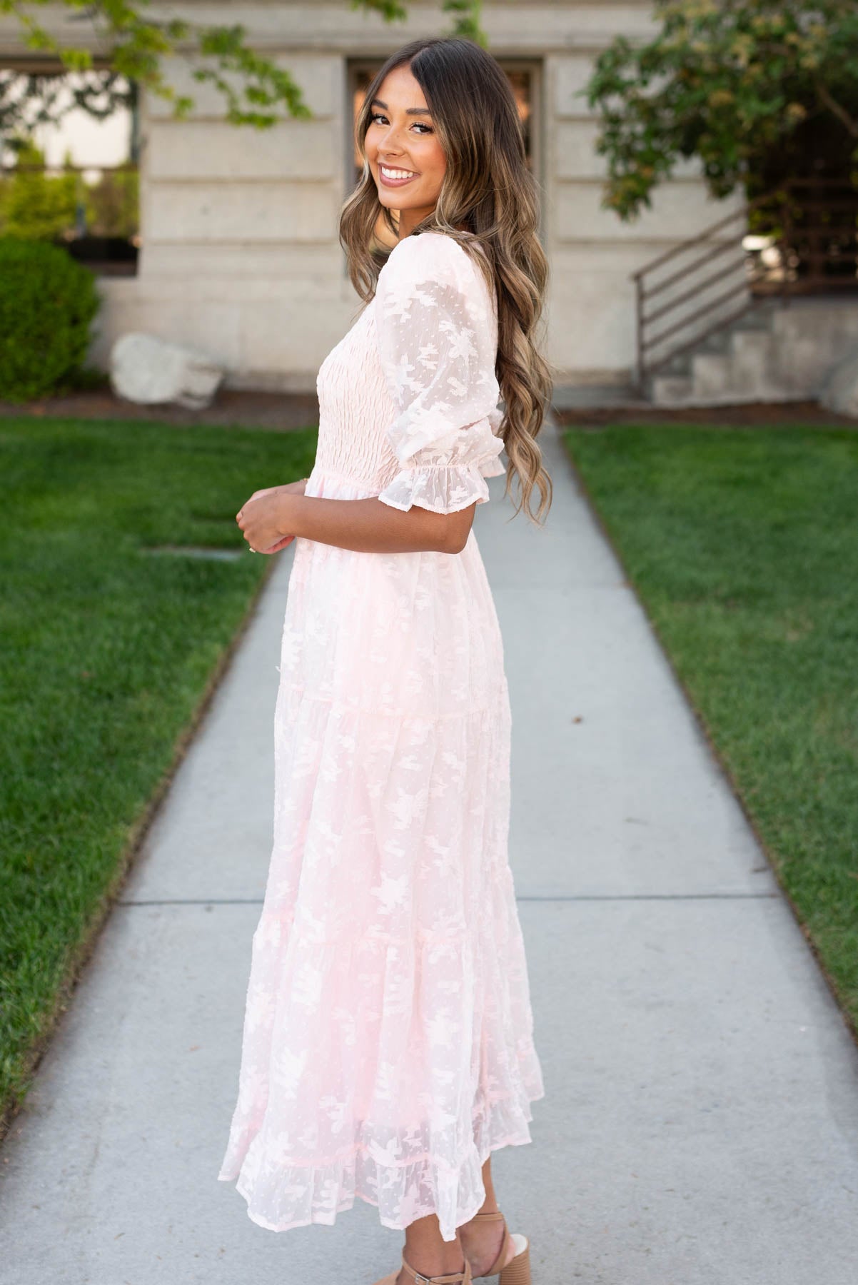 Side view of the blush v-neck maxi dress with sheer sleeves 