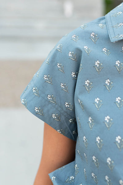 Close up of the sleeve on the steel blue floral top