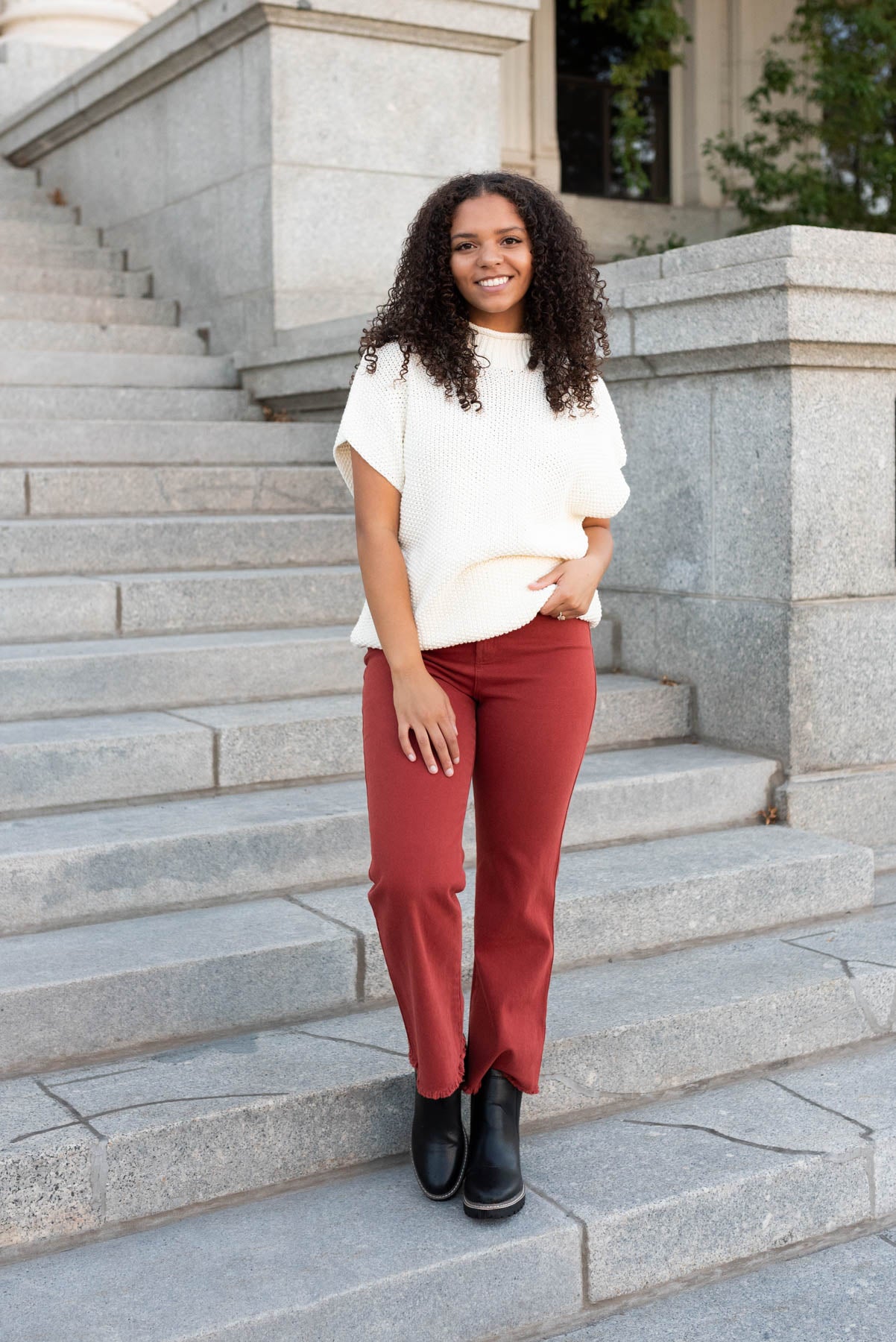 Front view of the red clay high rise pants