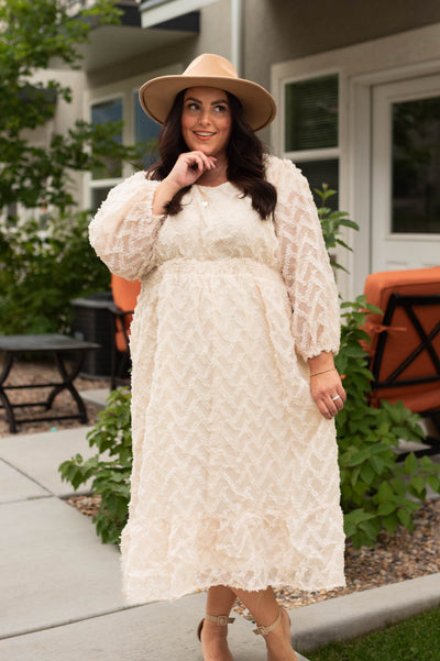 Plus size cream textured dress