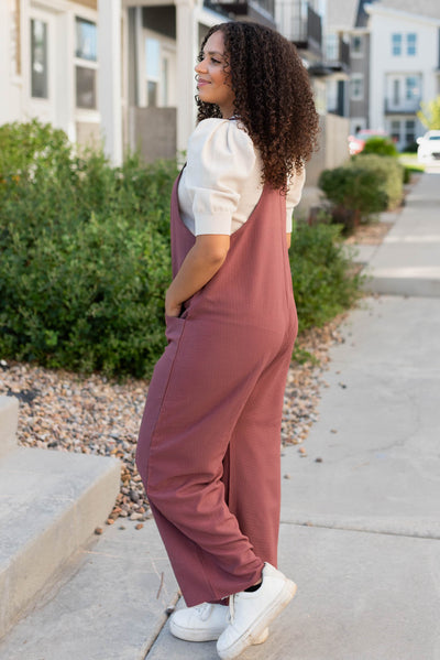 Side view of the mahogany woven overalls 