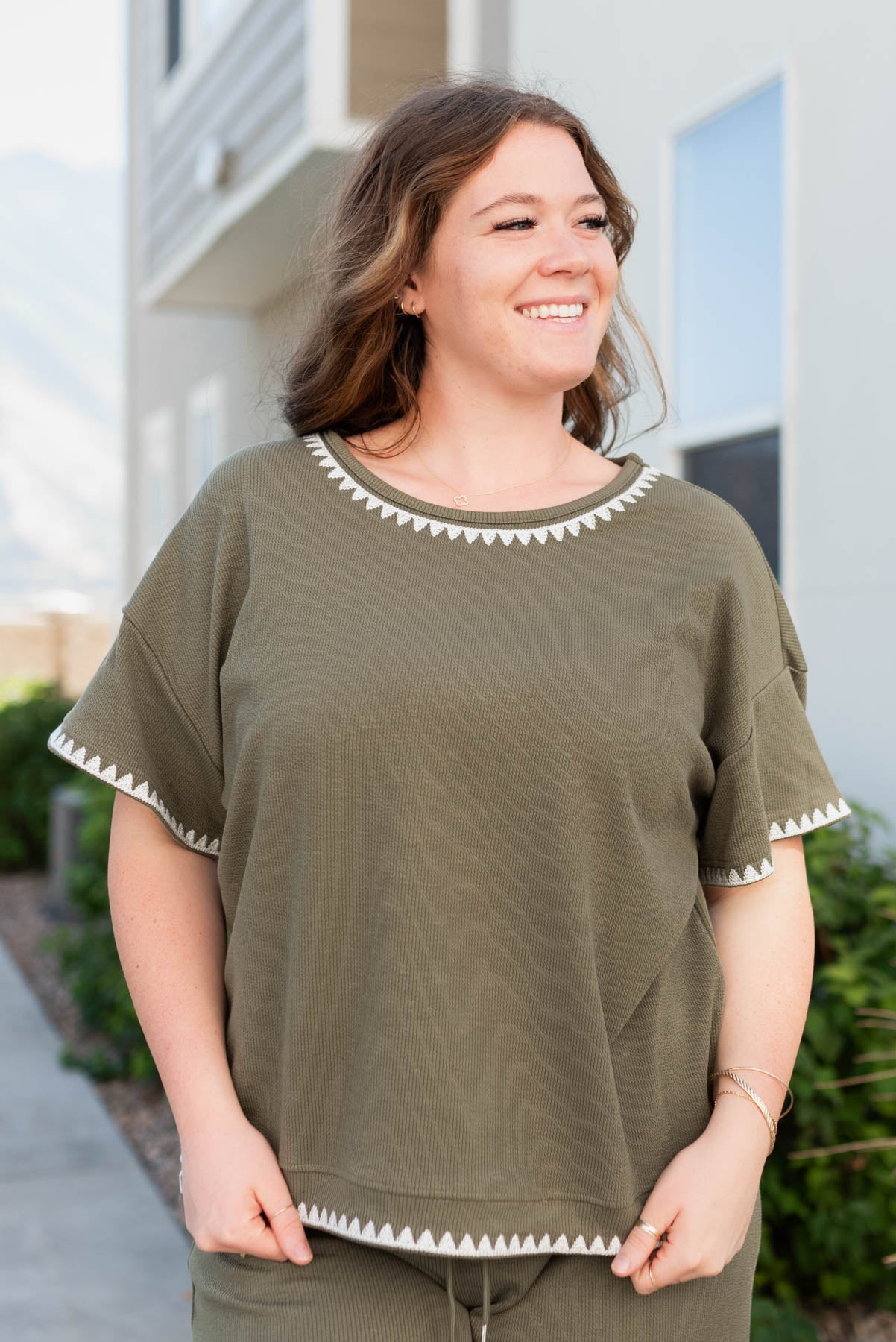 Plus size olive embroidered top