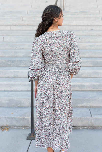 Back view of the burgundy floral dress