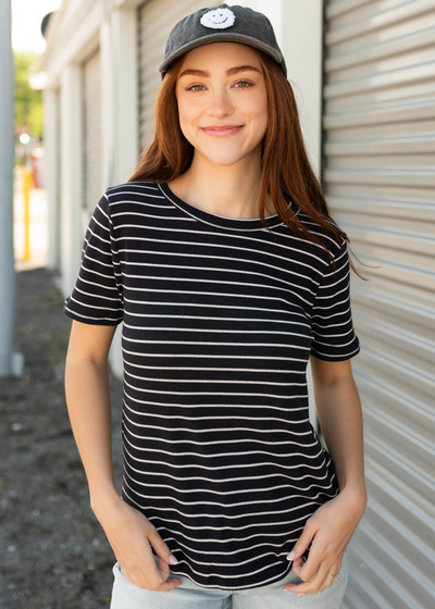 Front view of the navy stripe ribbed top