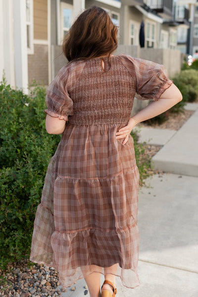 Back view of the plus size brown plaid dress