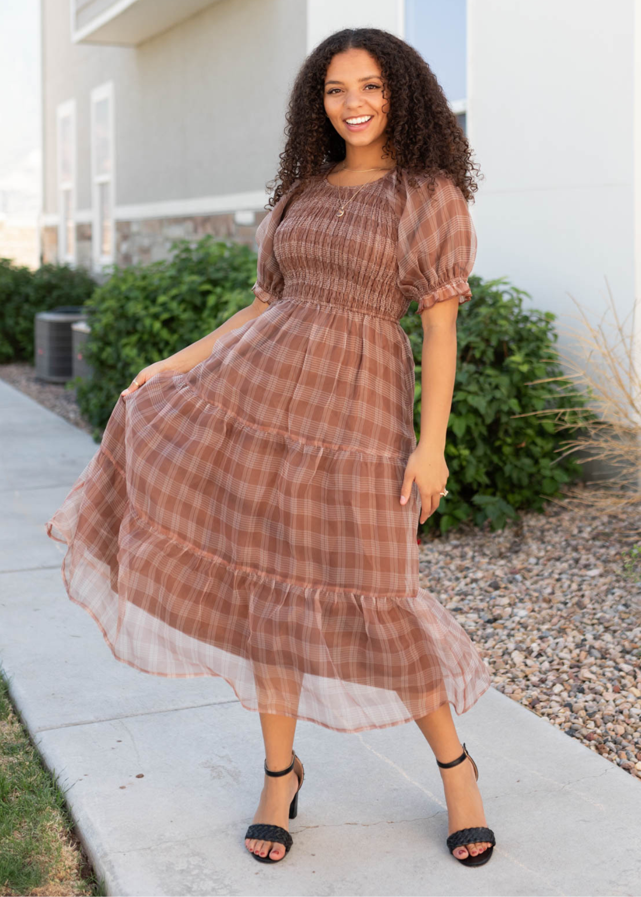 Brown plaid dress with a tiered skirt