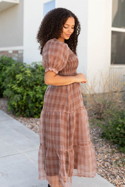 Side view of the brown plaid dress