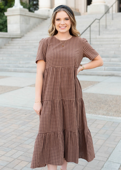 Brown gingham dress with tiered skirt