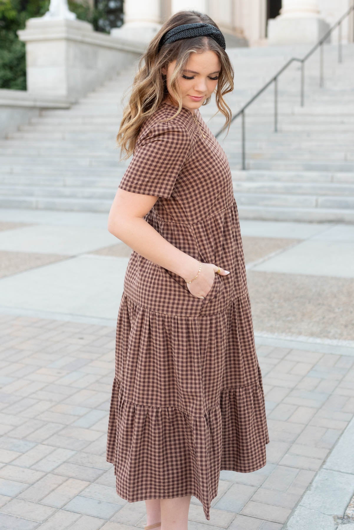 Side view of the brown gingham dress