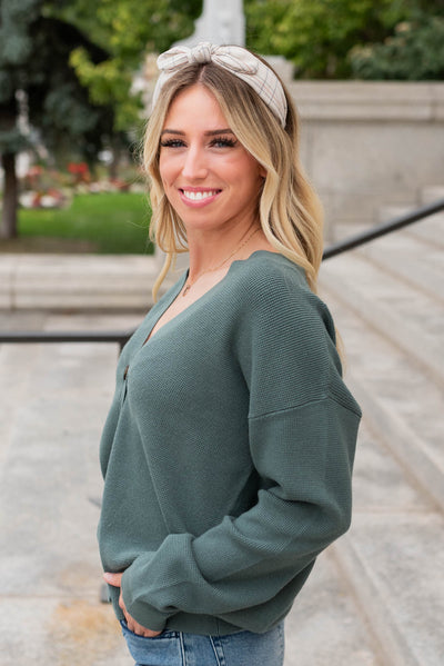 Side view of the jade buttondown cardigan