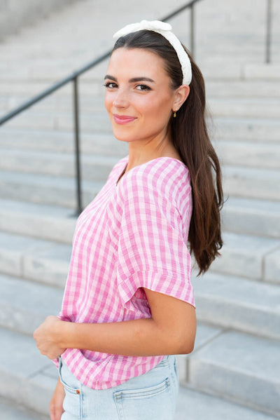 Side view of the pink gingham top