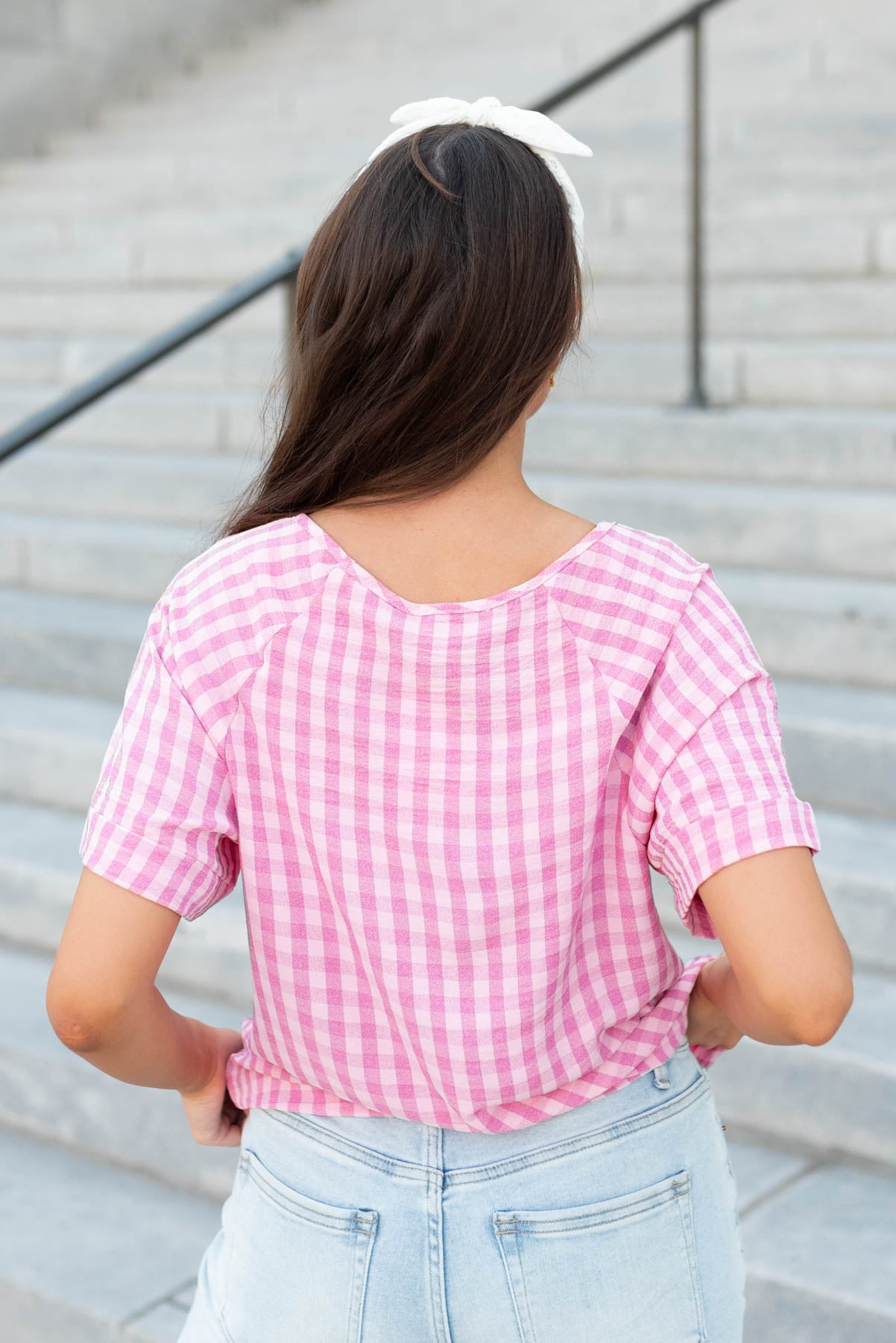 Back view of the pink gingham top