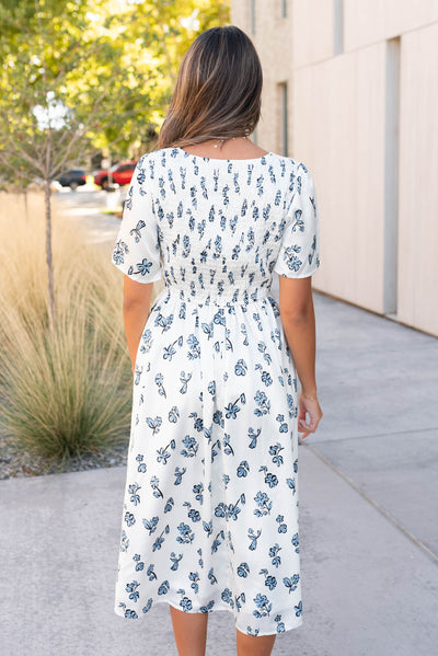 Back view of the blue floral dress