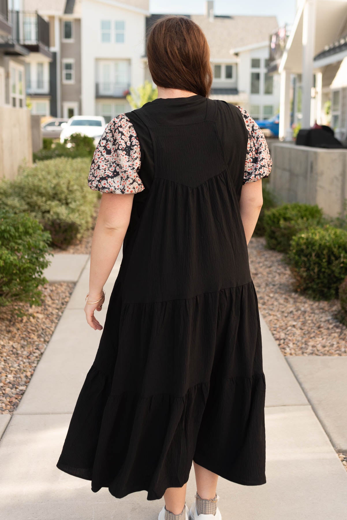 Back view of the black overall dress