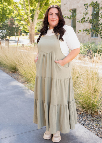 Plus size sage green overall dress with adjustable button straps