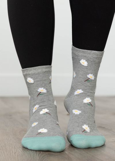 Front view of grey daisy garden socks