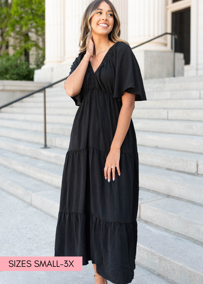 Black tiered maxi dress with short sleeves and v-neck