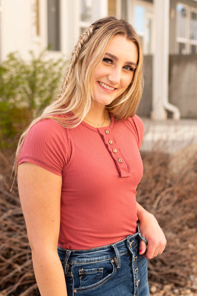 Dark mauve top with 4 buttons