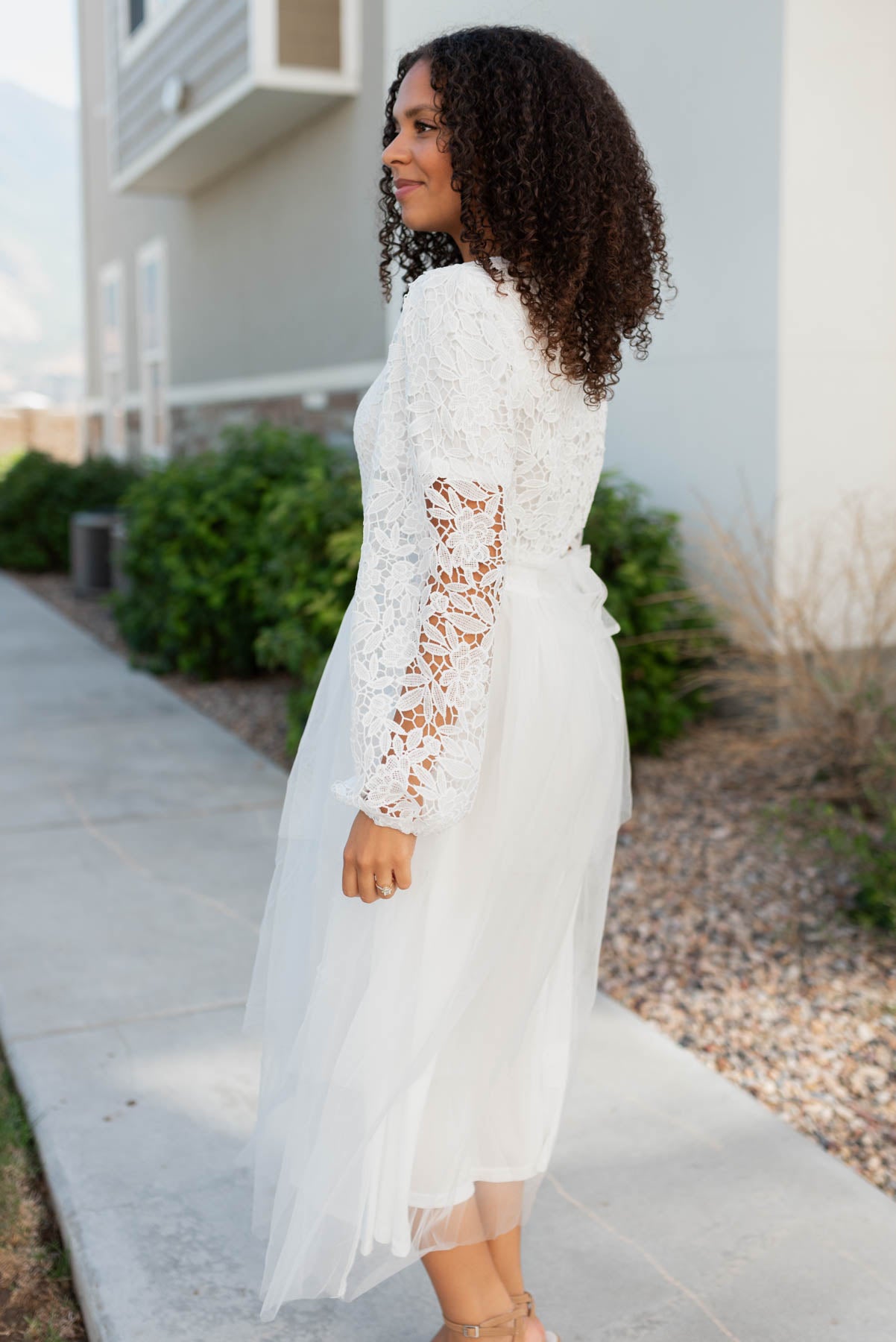 Side view of the white lace tulle dress