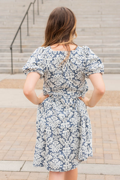 Back view of the navy multi floral dress