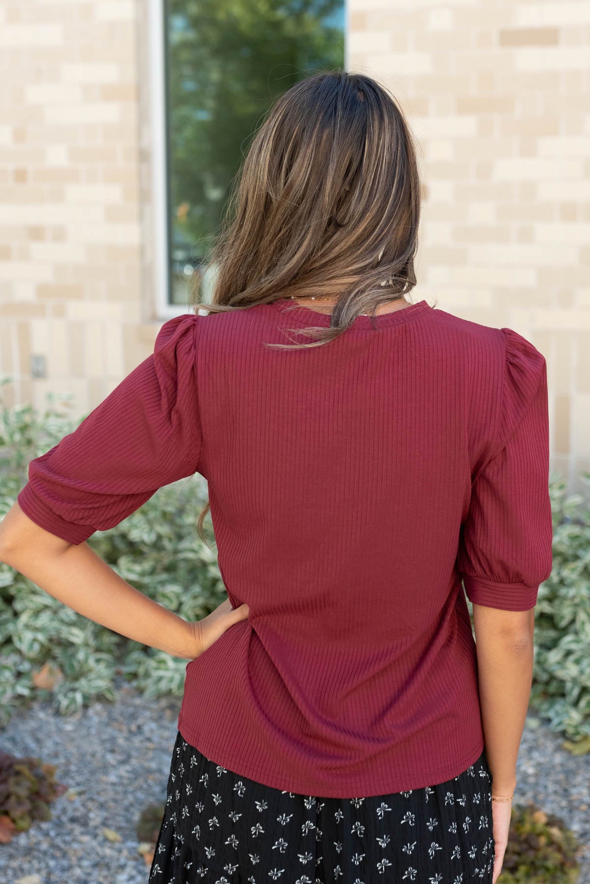 Back view of the basic burgundy top