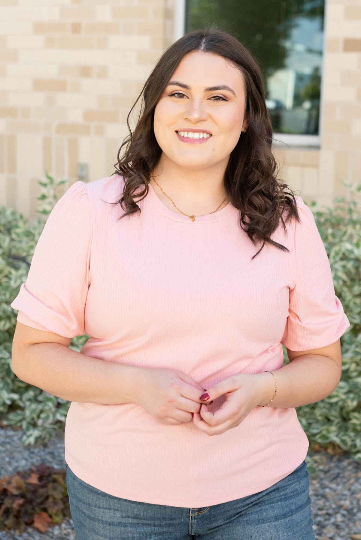 Front view of the plus size basic pink top