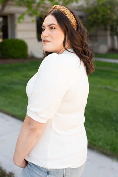 Side view of the plus size basic white top