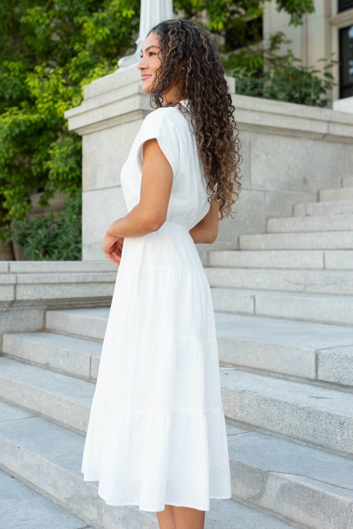 Side view of the white collared tiered dress
