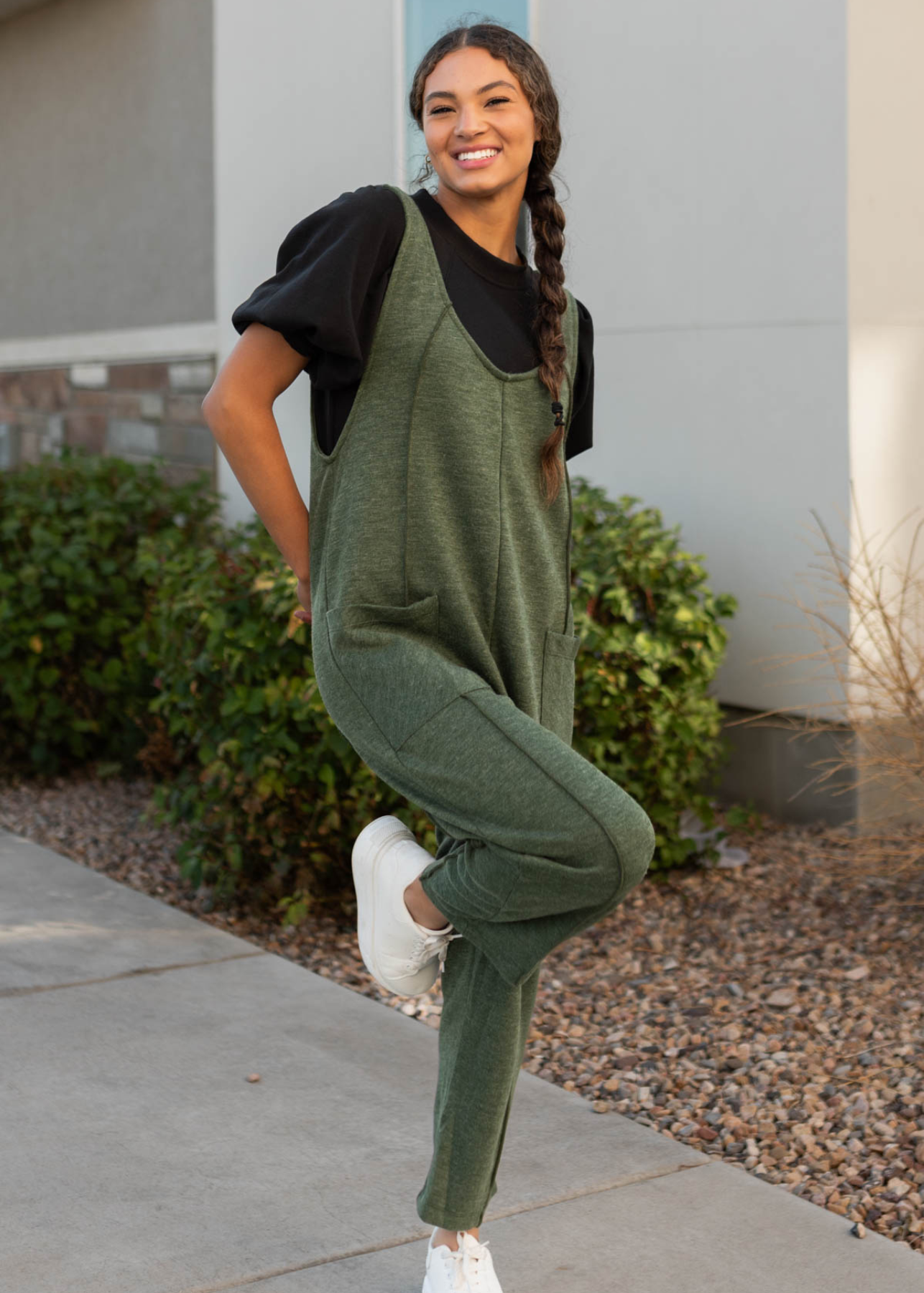 Wide v-neck on the olive overalls