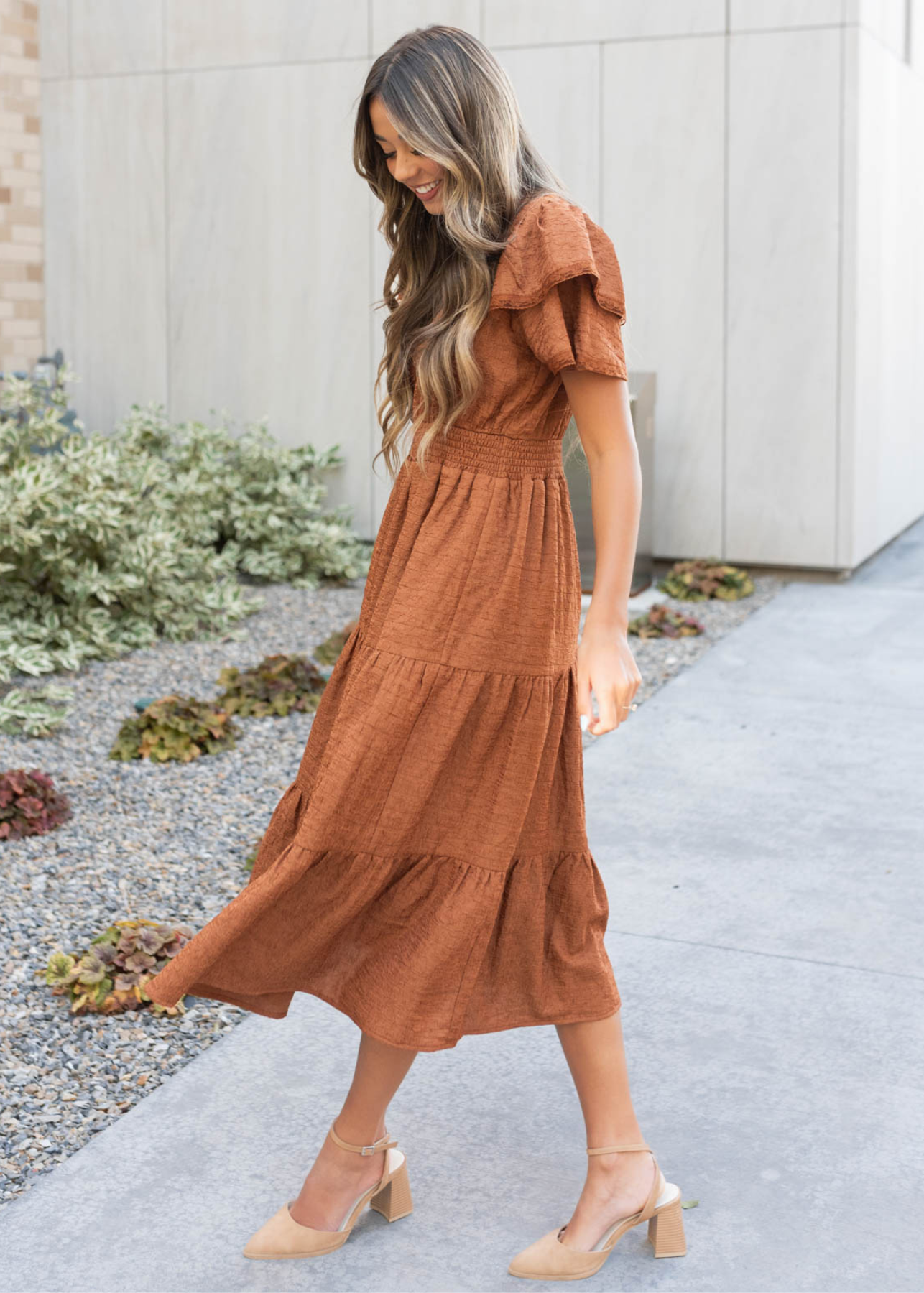 Side view of the chestnut ruffle tiered dress