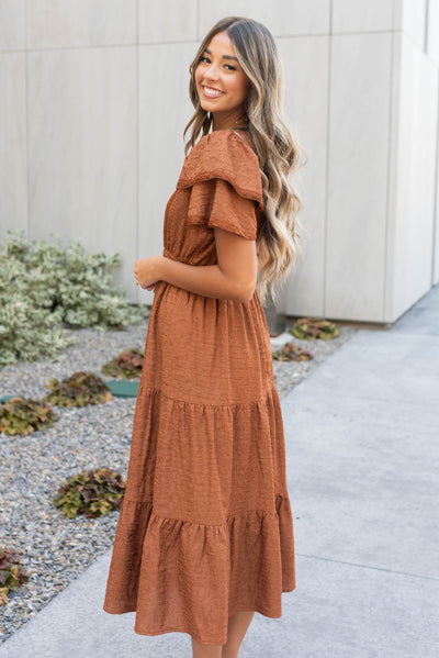 Side view of the chestnut ruffle tiered dress