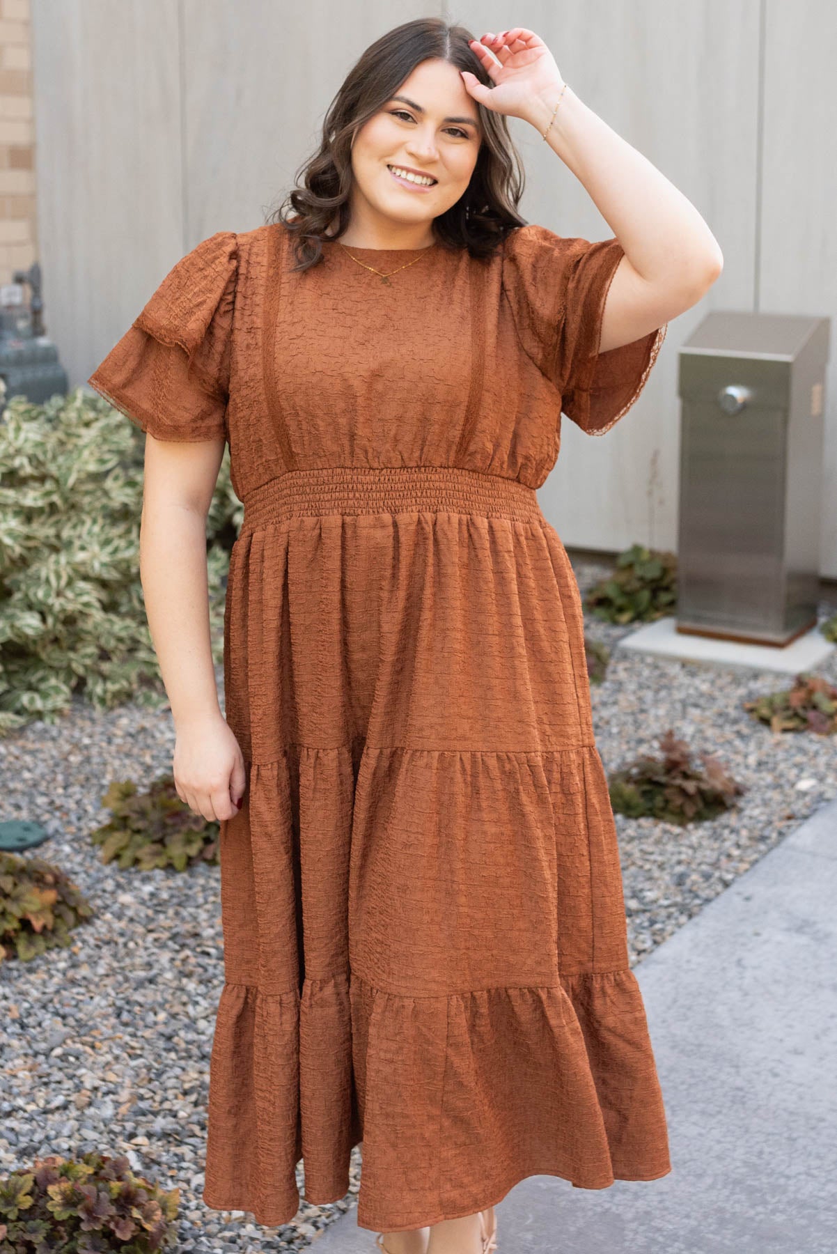 Front view of the chestnut ruffle tiered dress with elasitc waist