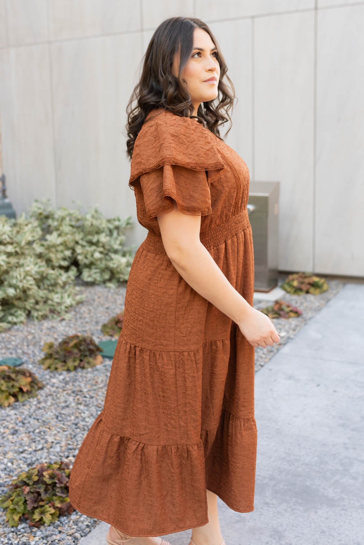 Side view of the plus size chestnut ruffle tiered dress