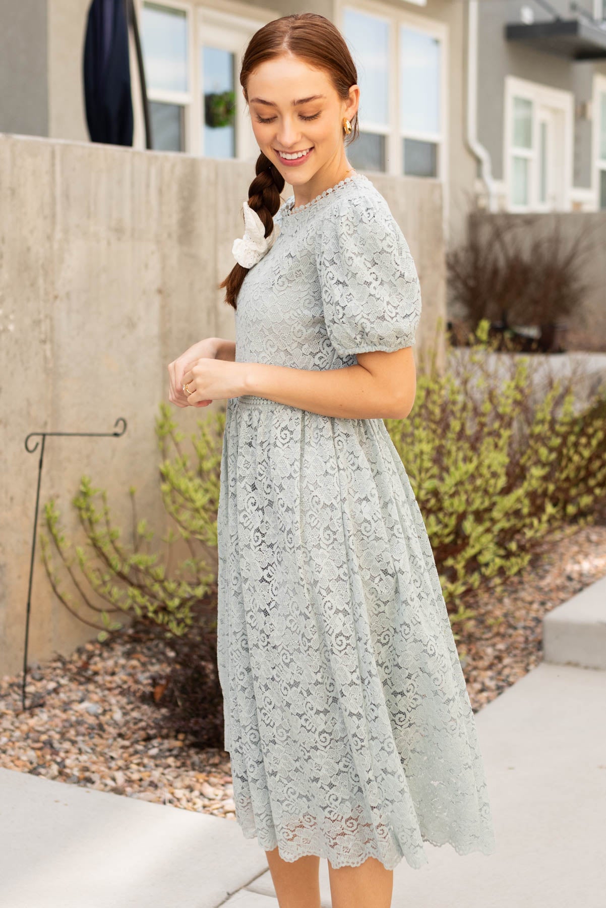 Side view of the sage blue lace dress