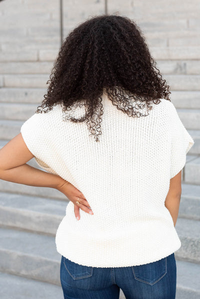 Back view of the cream crochet top