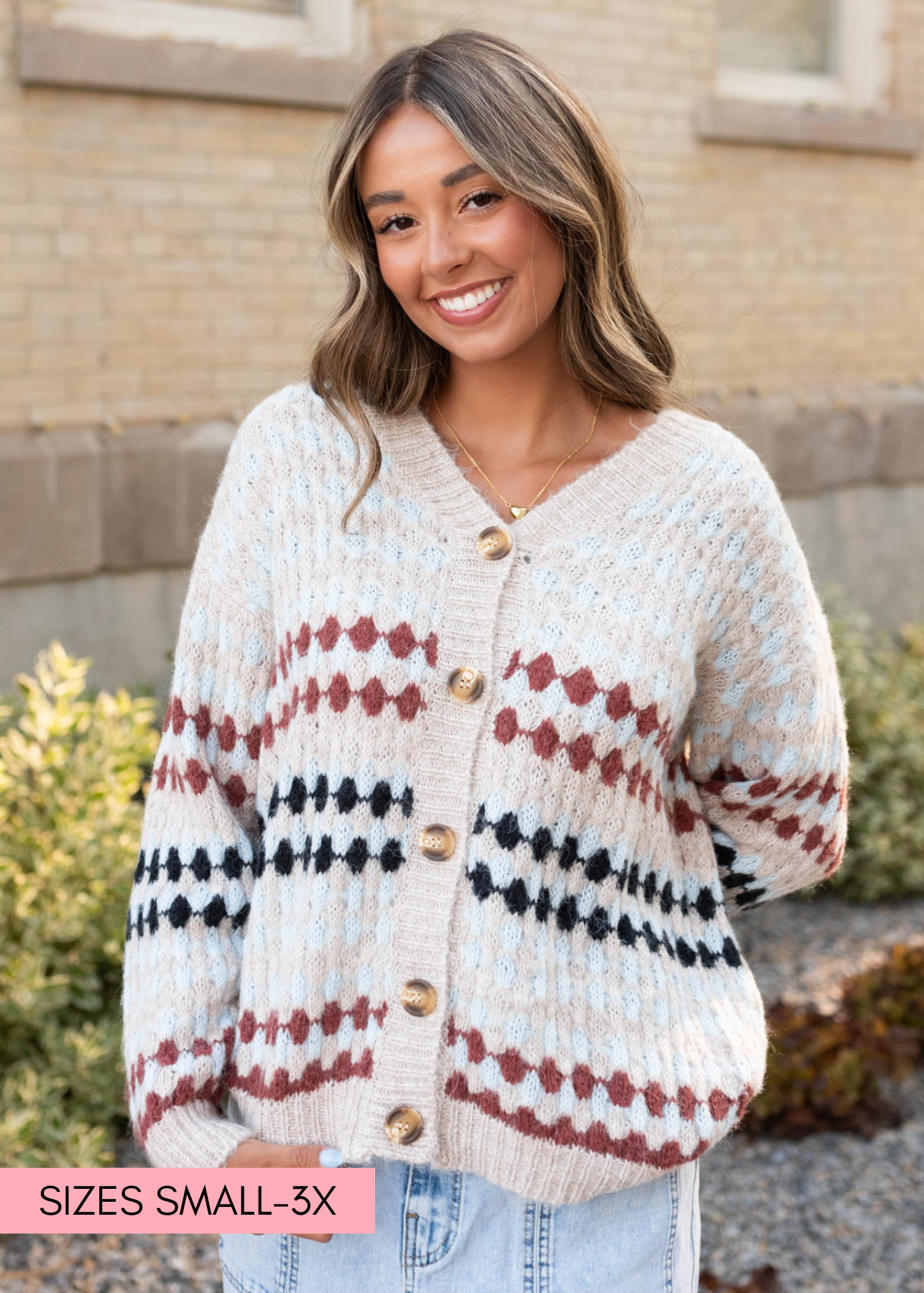 Taupe pattern cardigan with navy, light blue anad rust colors