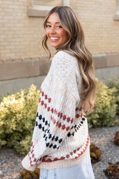 Side view of the taupe pattern cardigan