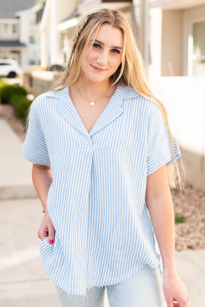 Sky blue polo shirt with short sleeves