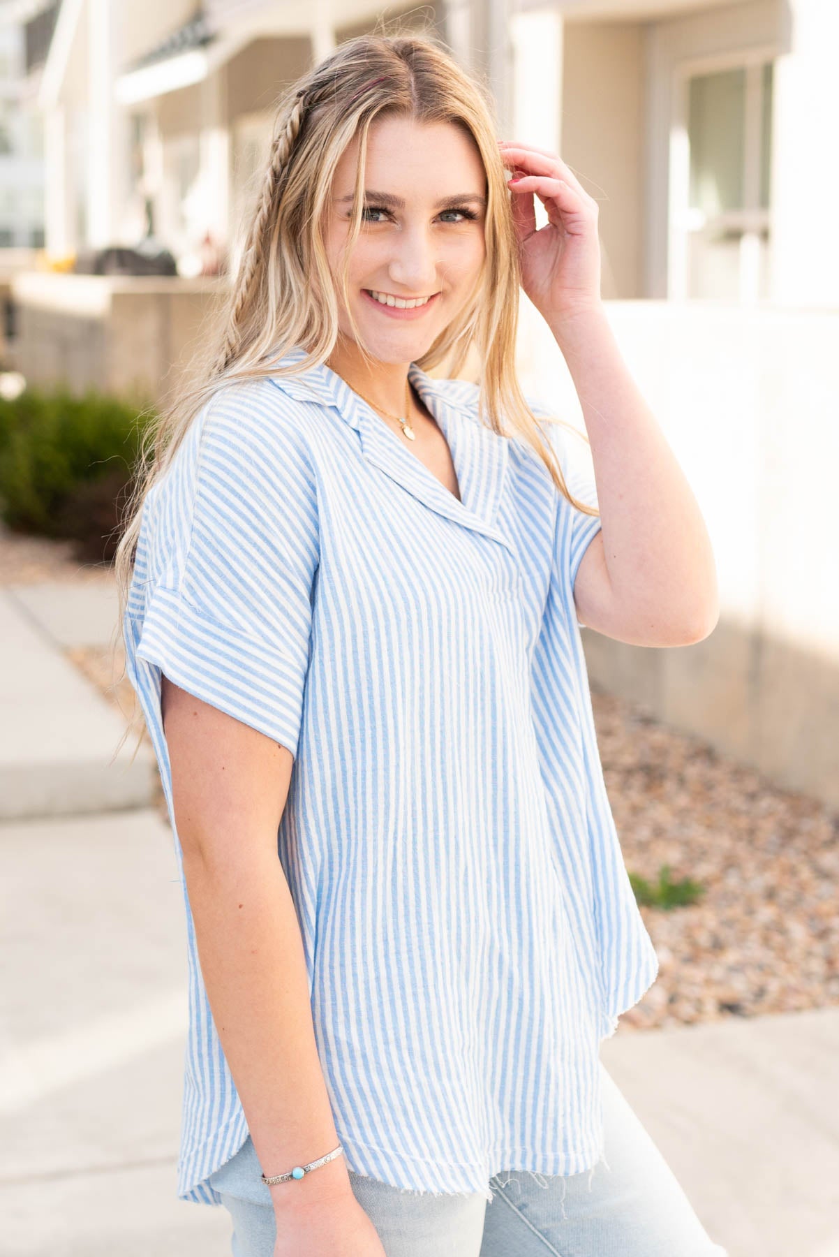 Side view of the sky blue polo shirt