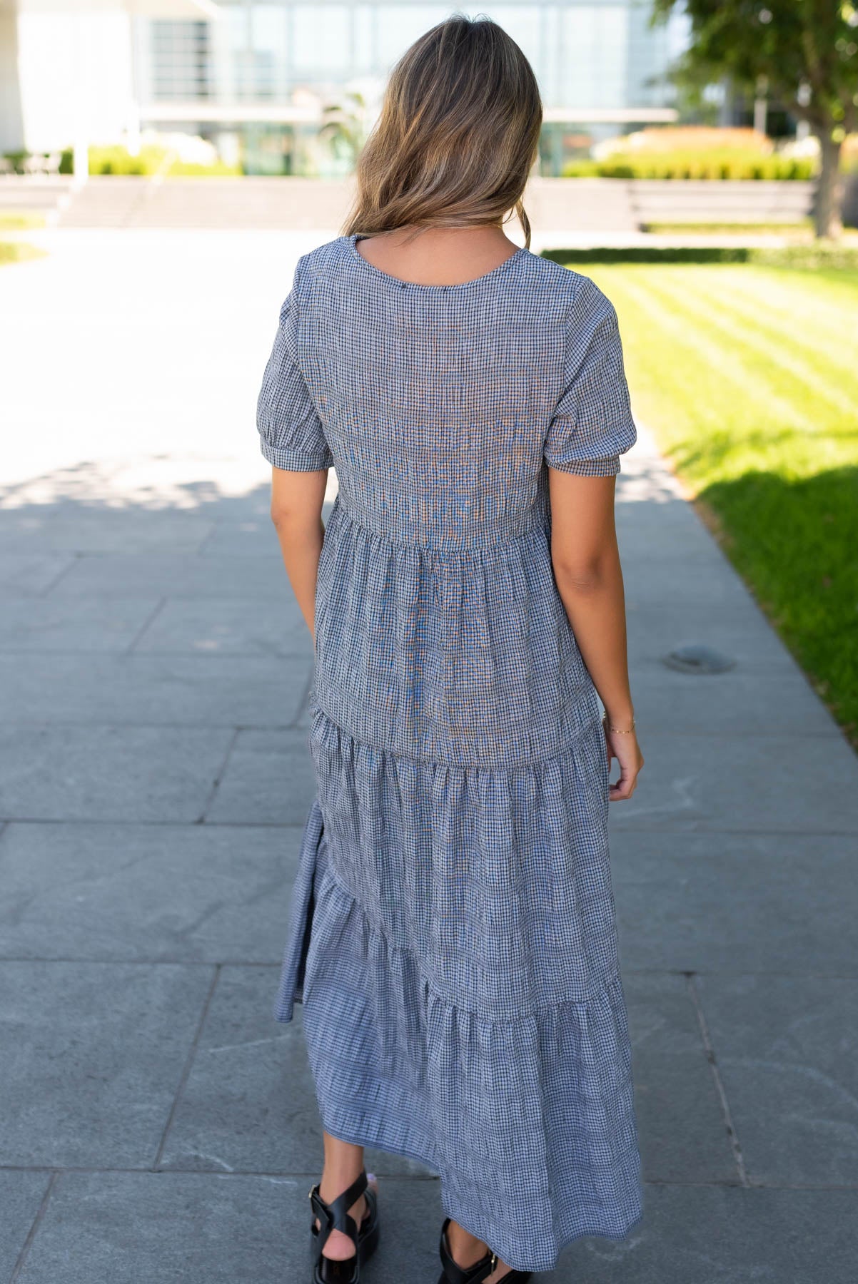 Back view of the charcoal gingham dress