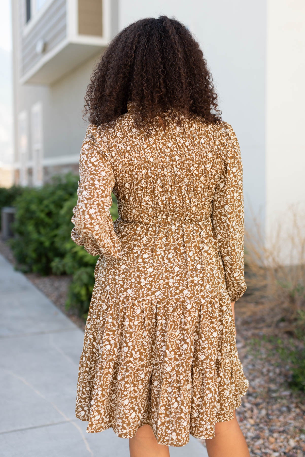 Back view of the chestnut floral smocked dress