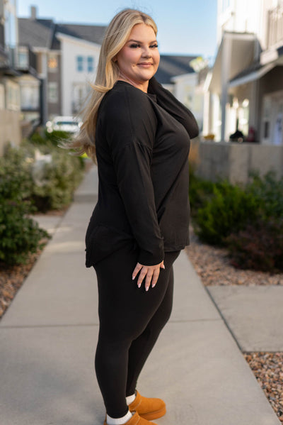 Side view of a plus size black lounge wear set