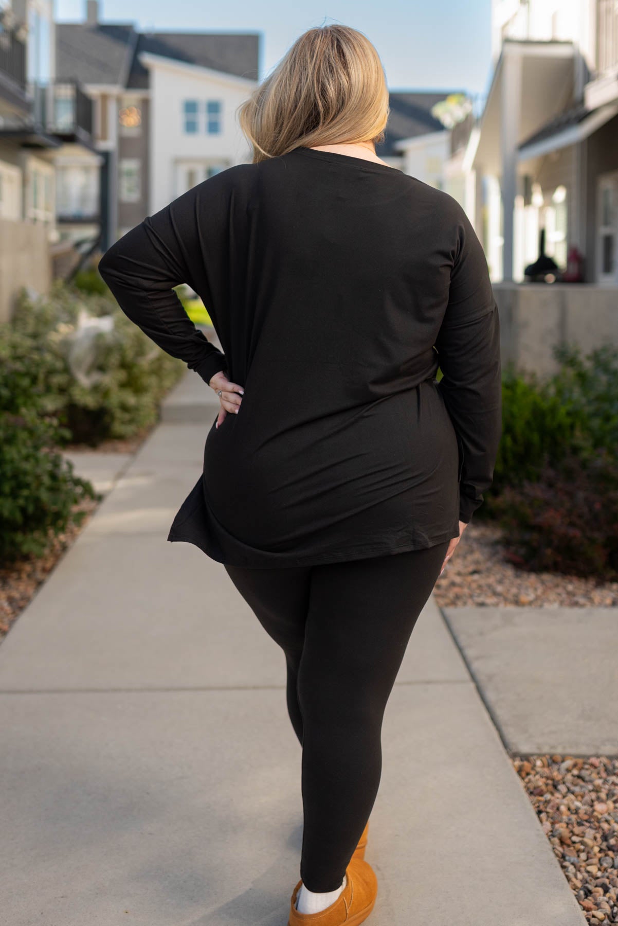 Back view of a plus size black lounge wear set