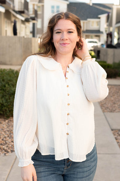 Plus size cream long sleeve top