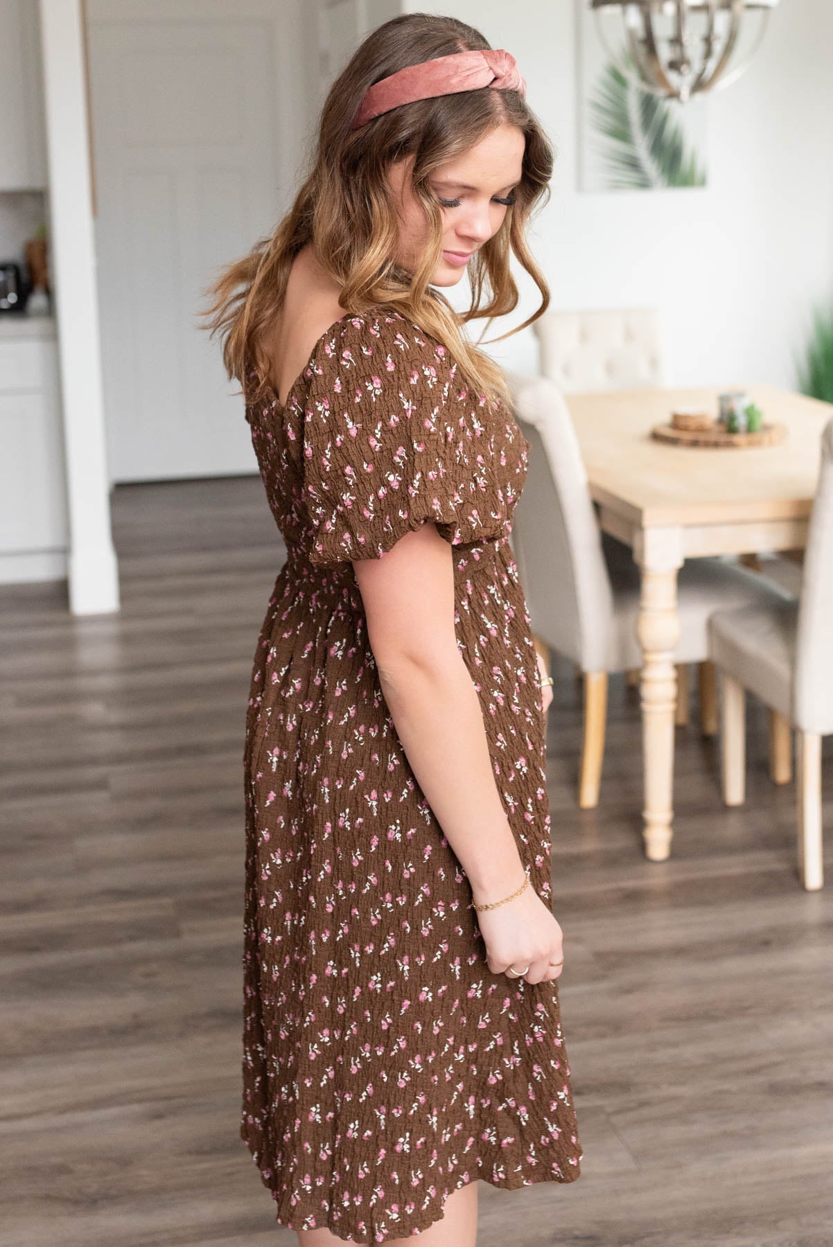 Side view of the brown floral dress