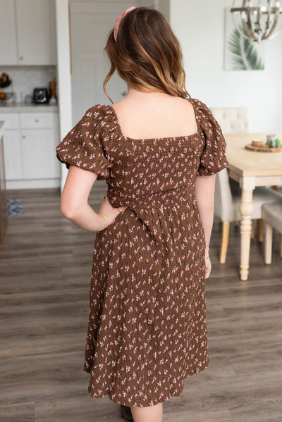 Back view of the brown floral dress