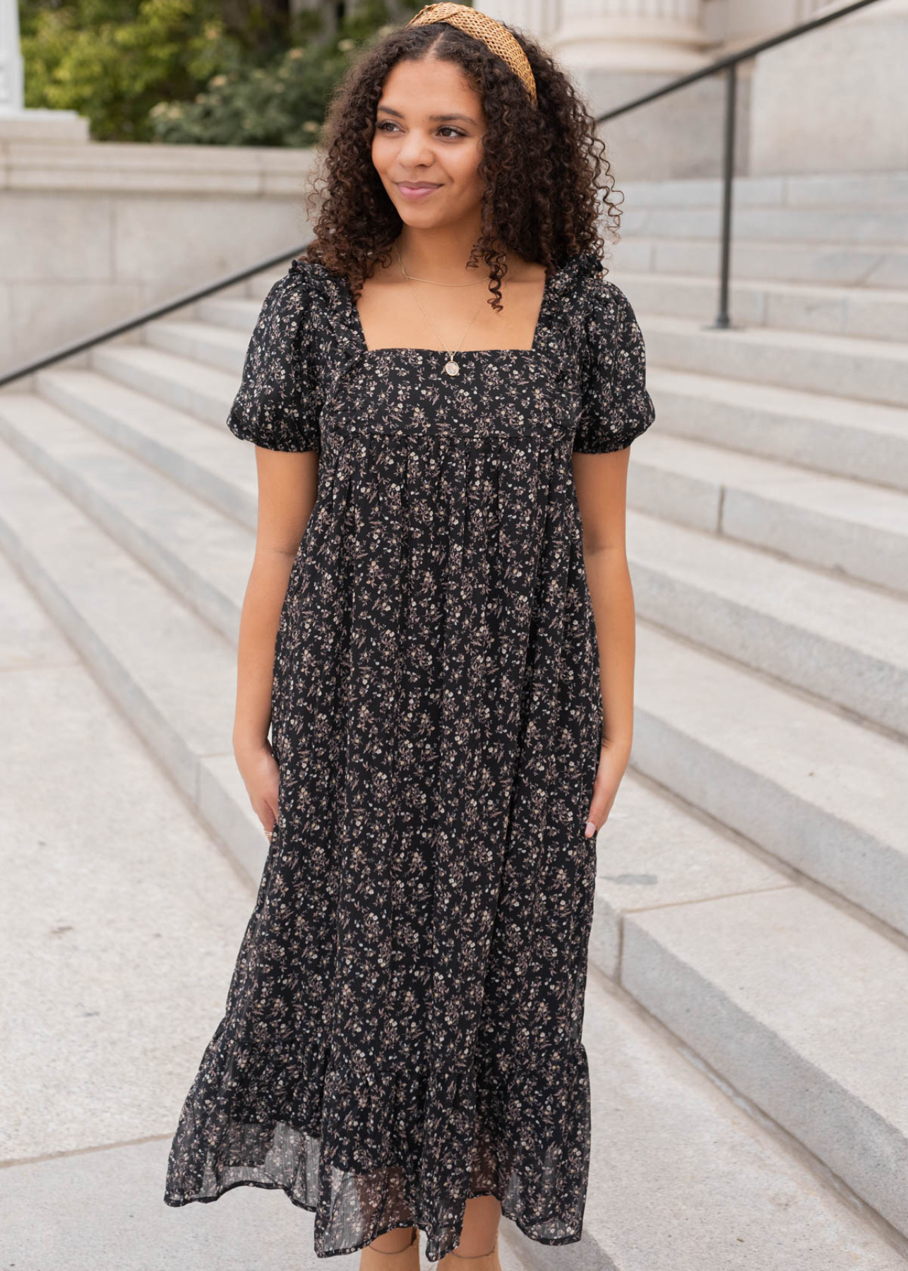 Black floral dress with a square neck