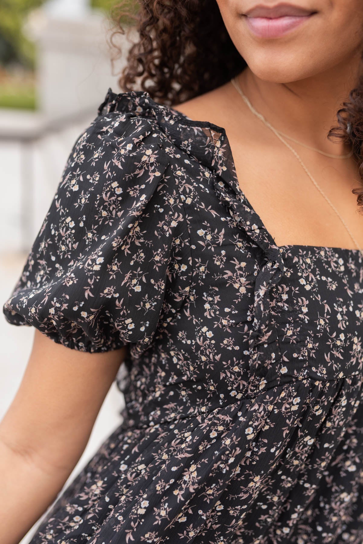 Close up of the fabirc on the black floral dress